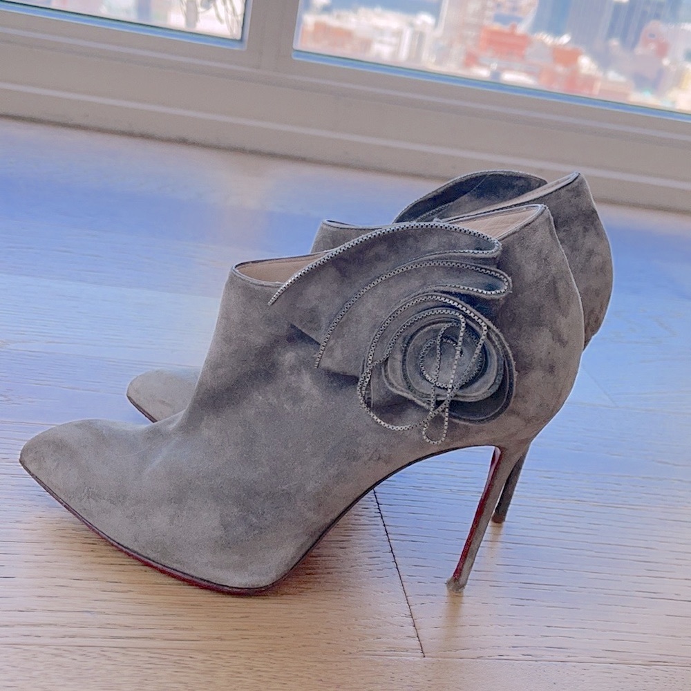 Authentic Louboutin shoes, travel bag is included